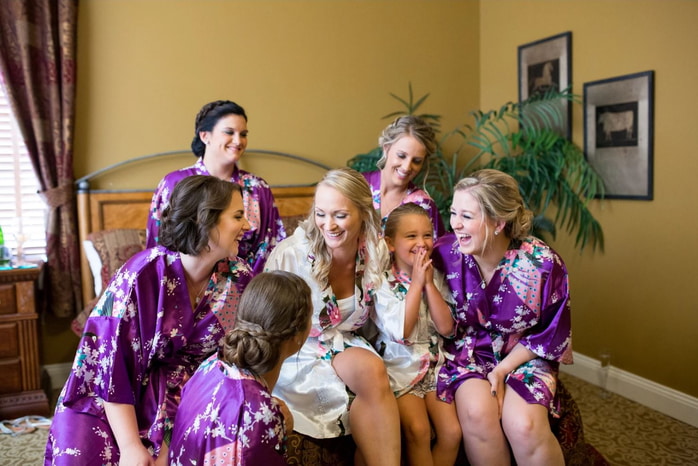 Beautiful close-up portrait of a bride on her wedding day, smiling softly.