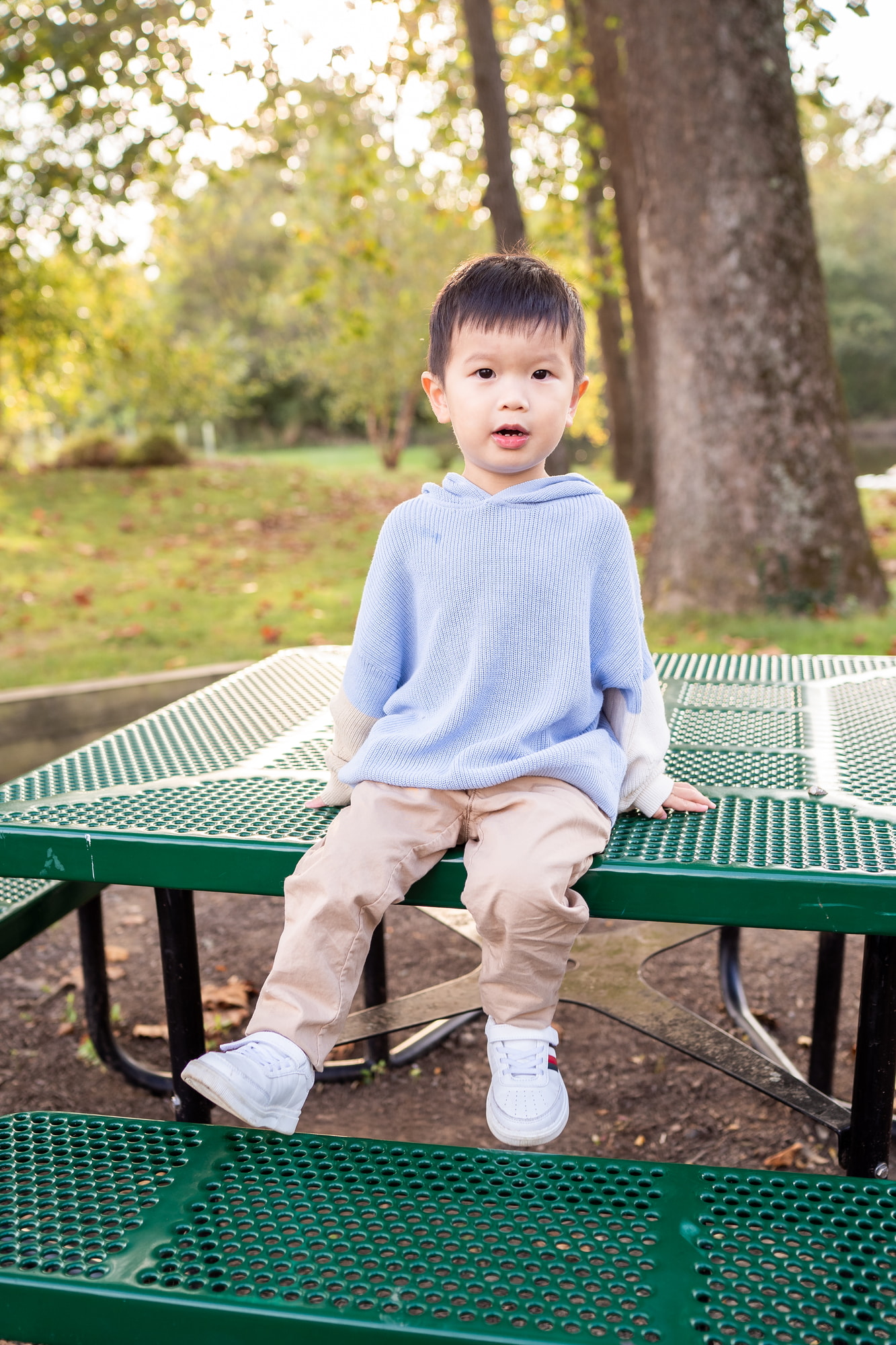Family sitting on rocks