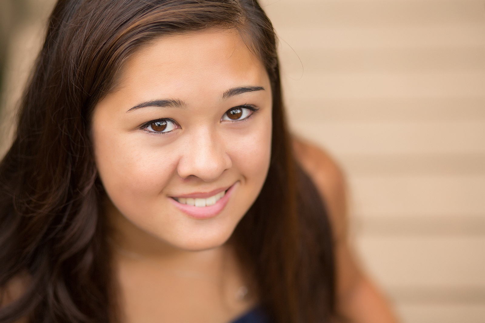 Senior girl thoughtful outdoor portrait