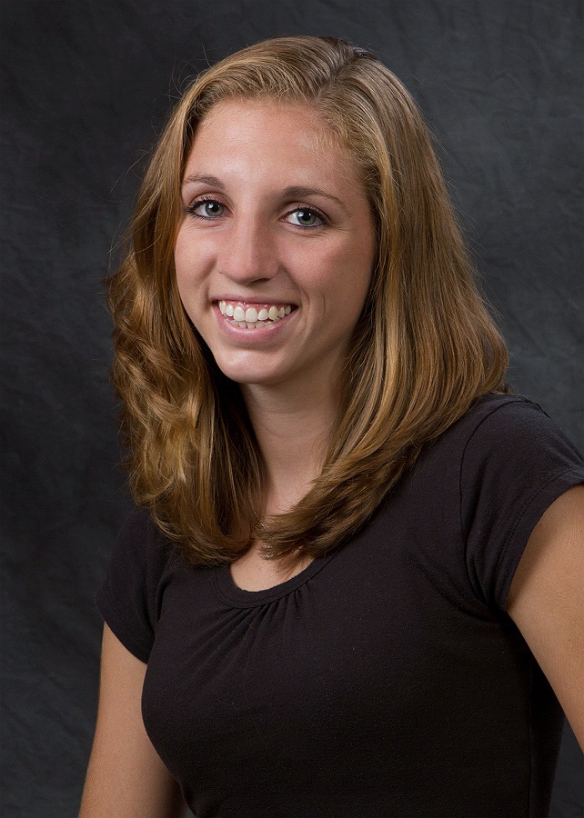 Senior girl striking a fashion-forward pose