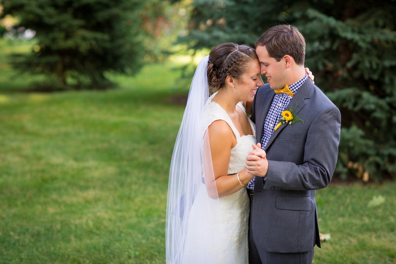 Dan and Kendra, wedding couple smiling